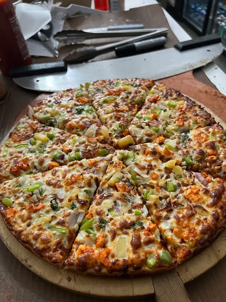 Halal food options and gluten-free pizza at Boss Pizza Edmonton